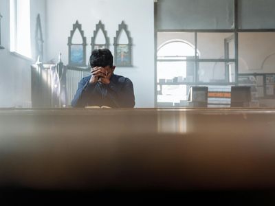 Hands folded in a mudra position
